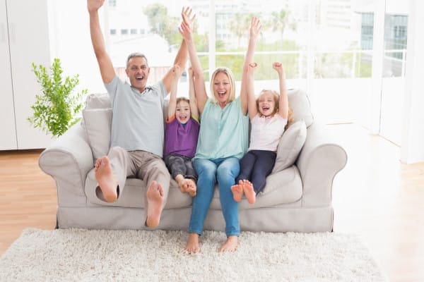 happy family excited getting HVAC system ready for Spring